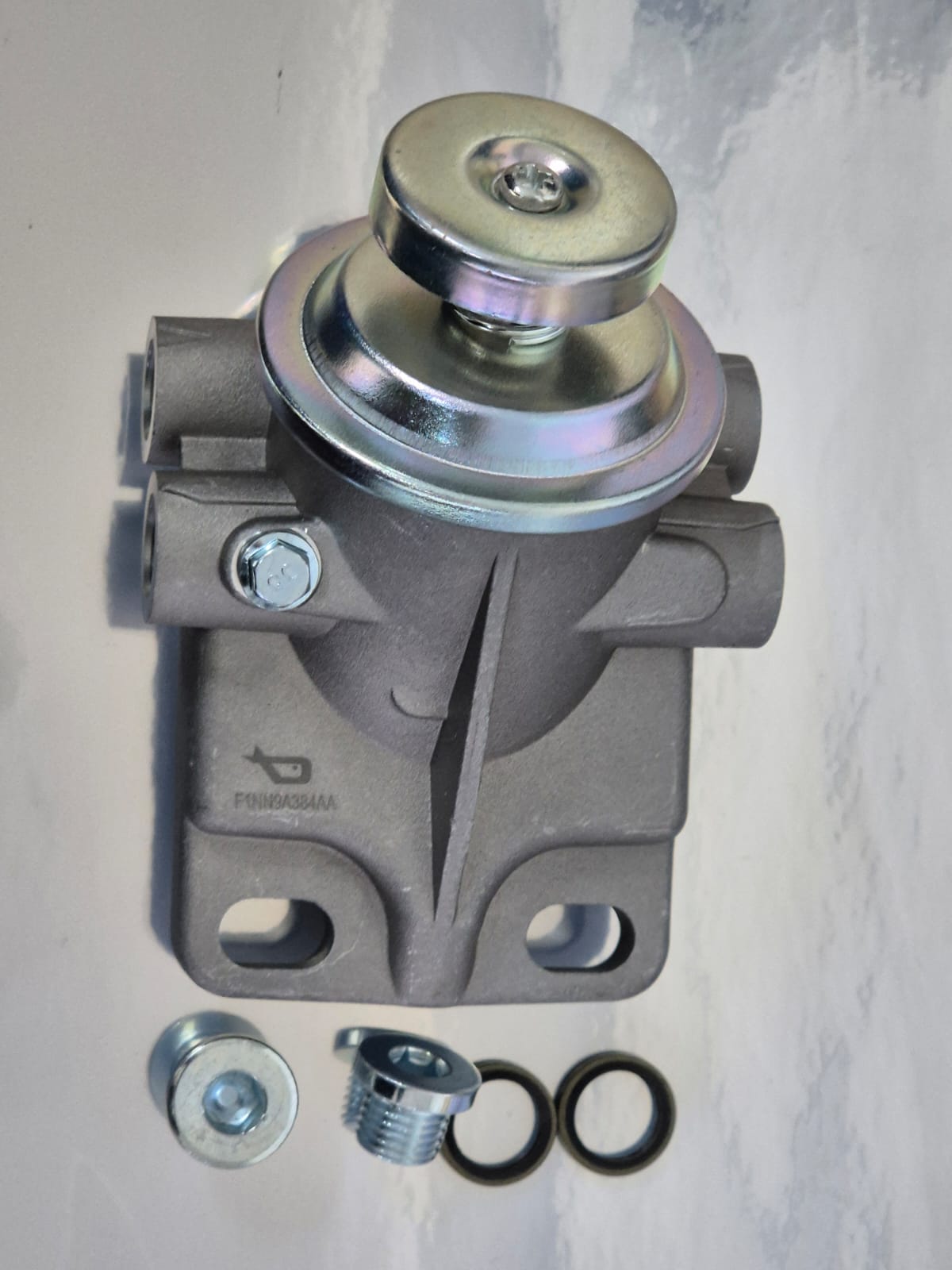 SF108I2 - F1NN9A384AA   CABEÇOTE FILTRO NEW HOLLAND TRATORES 5030/5630/6630/7630/7830/8030